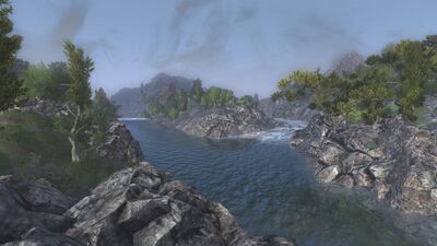 As it enters the gorge, one branch of the river splits off and heads through Kûgrun, the Golden Sanctuary and on to Vartúlin.