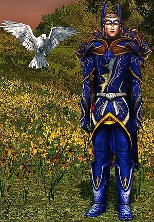 Character wearing blue robes next to his white eagle on a green lawn.
