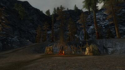Goblins crowd around a bonfire inside Clovenvale