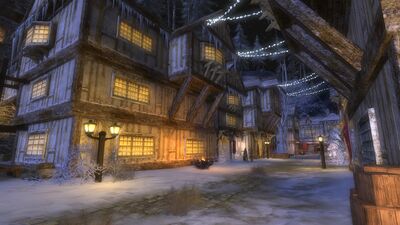 Cozy snow-dusted street under the shadow of night