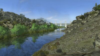The last stretch of the river is past the bridge, heaving out to the coast.