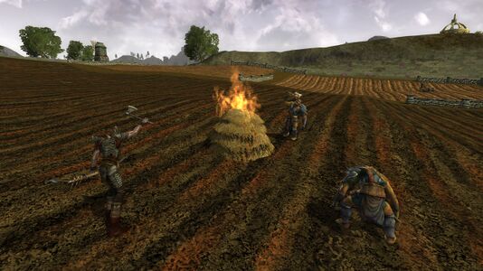 Orcs relishing in the destruction of a haypile