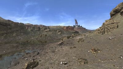 The Dawn-warden also gazes across the sad remnants of the Agâl.