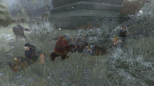 Farin attended to his cousin, the wounded King Thráin II, while the king's son Frerin lies slain.