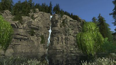 The third source waterfall widens the river.