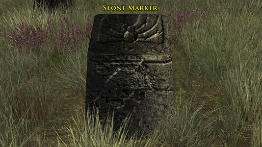 An old stone marker. Worn runes carved into the stone indicate that land was granted to a farmer of Arthedain named "Gilmar"